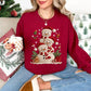 "Christmas Crochet Snowmen" graphic on a Gildan 18000 Sweatshirt in the color dark red (cardinal red).