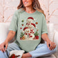 "Christmas Crochet Snowmen" on a Comfort Colors 1717 T-Shirt in the color muted teal-green (bay).