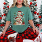 "Christmas Crochet Snowmen" on a Comfort Colors 1717 T-Shirt in the color soft light green (light green).