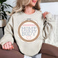 Cross Stitch Home Body graphic on light warm beige (sand) sweatshirt.