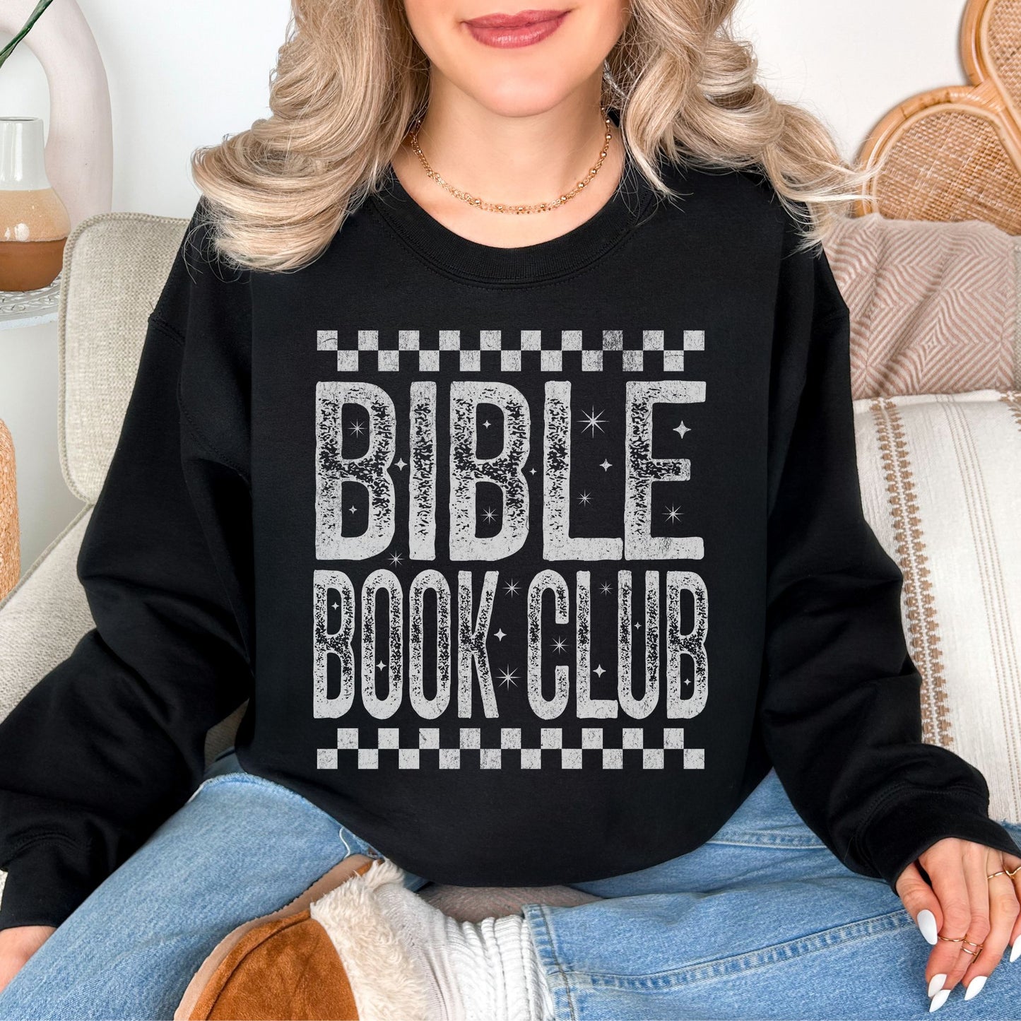 "Distressed Bible Book Club" graphic on deep black (black) sweatshirt