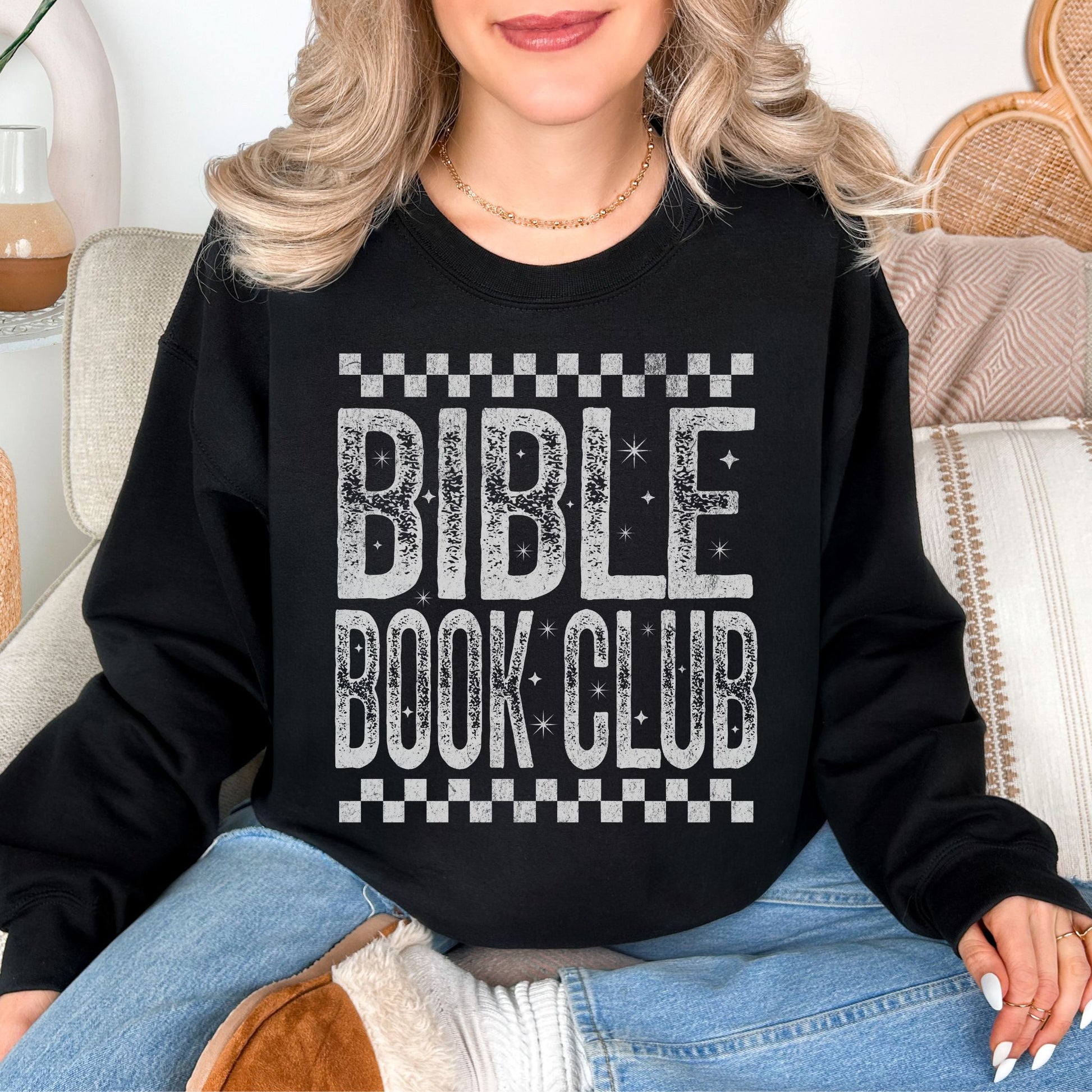 "Distressed Bible Book Club" graphic on deep black (black) sweatshirt