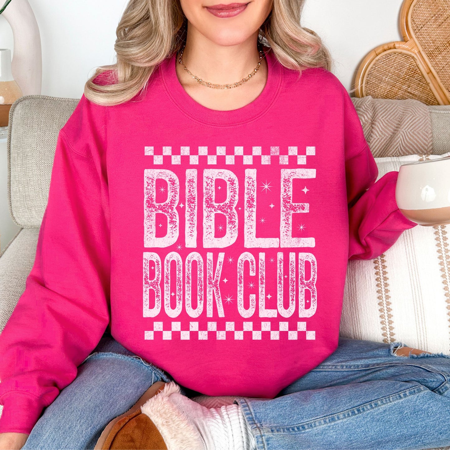 "Distressed Bible Book Club" graphic on bright pink (heliconia) sweatshirt