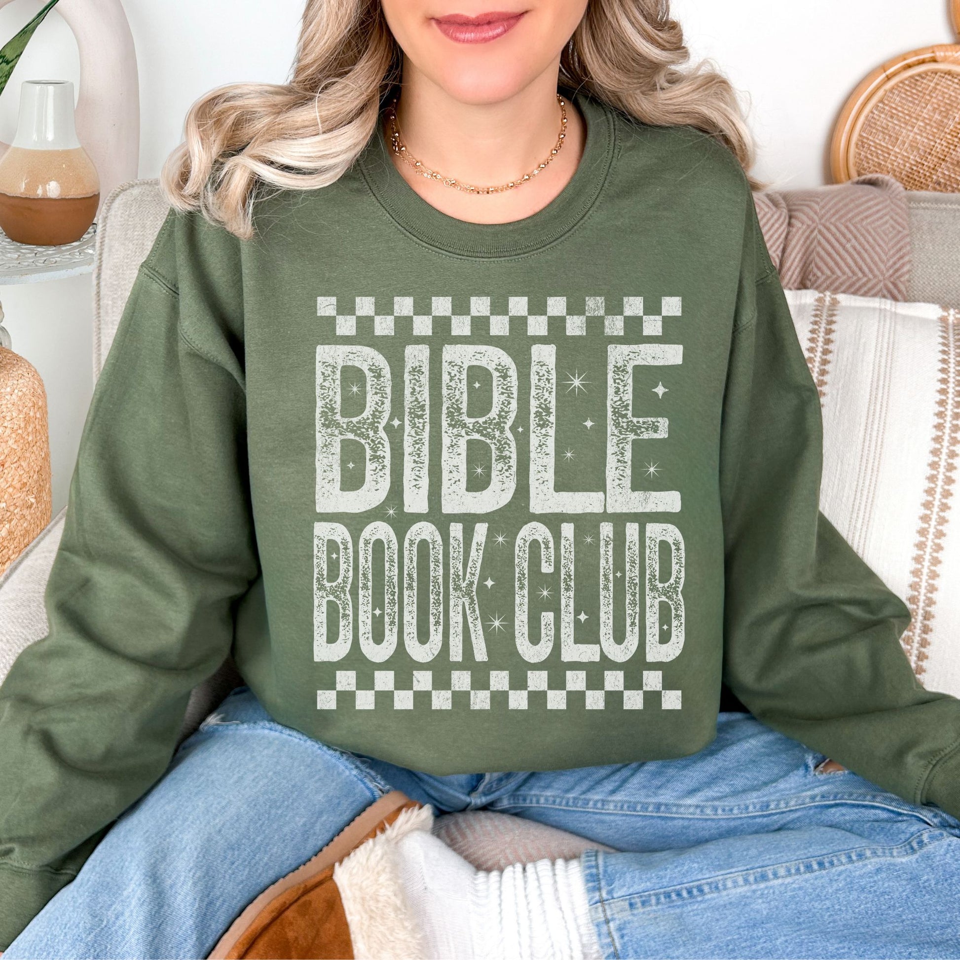 "Distressed Bible Book Club" graphic on muted olive green (military green) sweatshirt