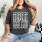 "Distressed Bible Book Club" graphic on a dark charcoal gray (pepper) T-Shirt