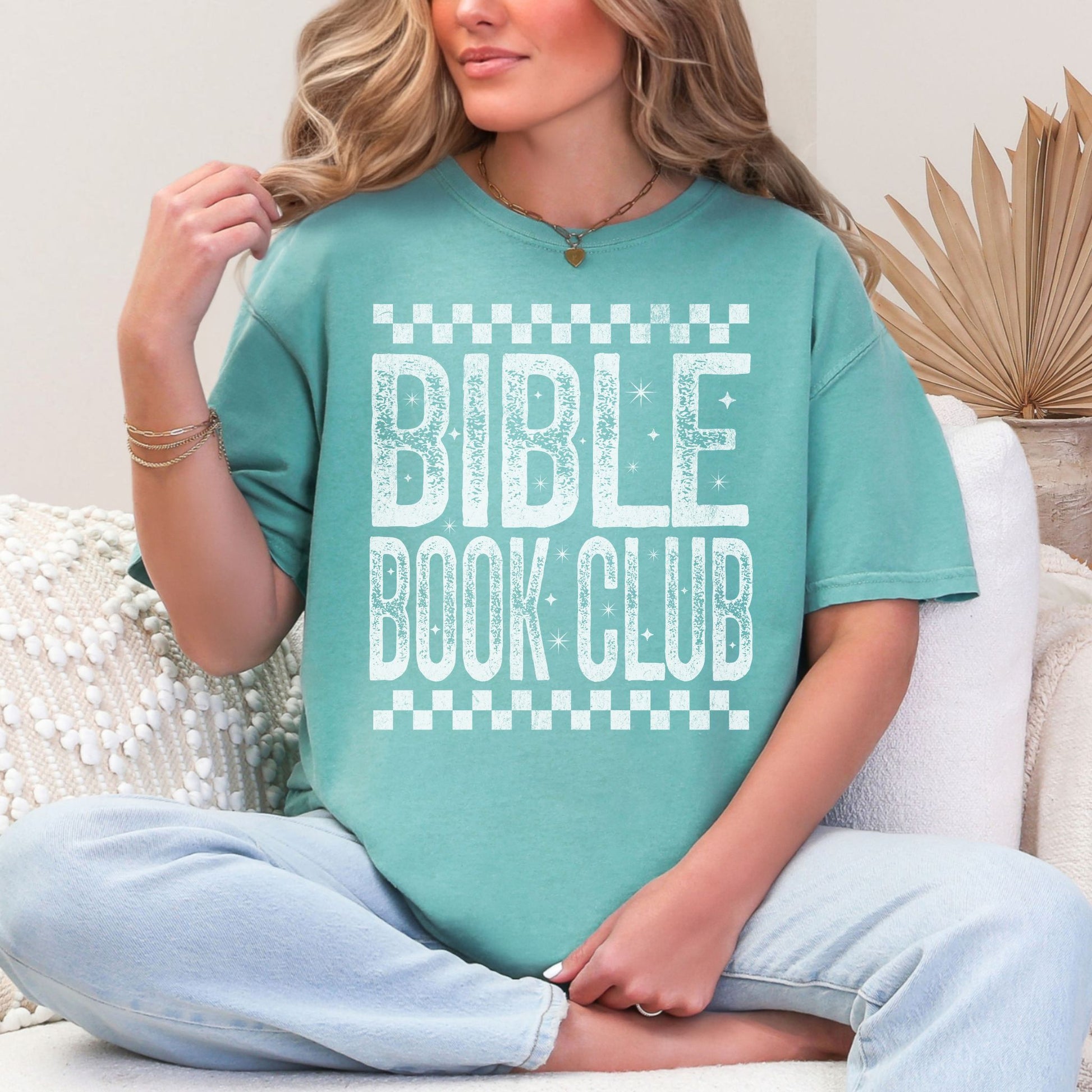 "Distressed Bible Book Club" graphic on a soft pale mint green (seafoam) T-Shirt