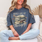 "Distressed Books Are My Therapy" graphic on muted medium blue (denim) T-Shirt.