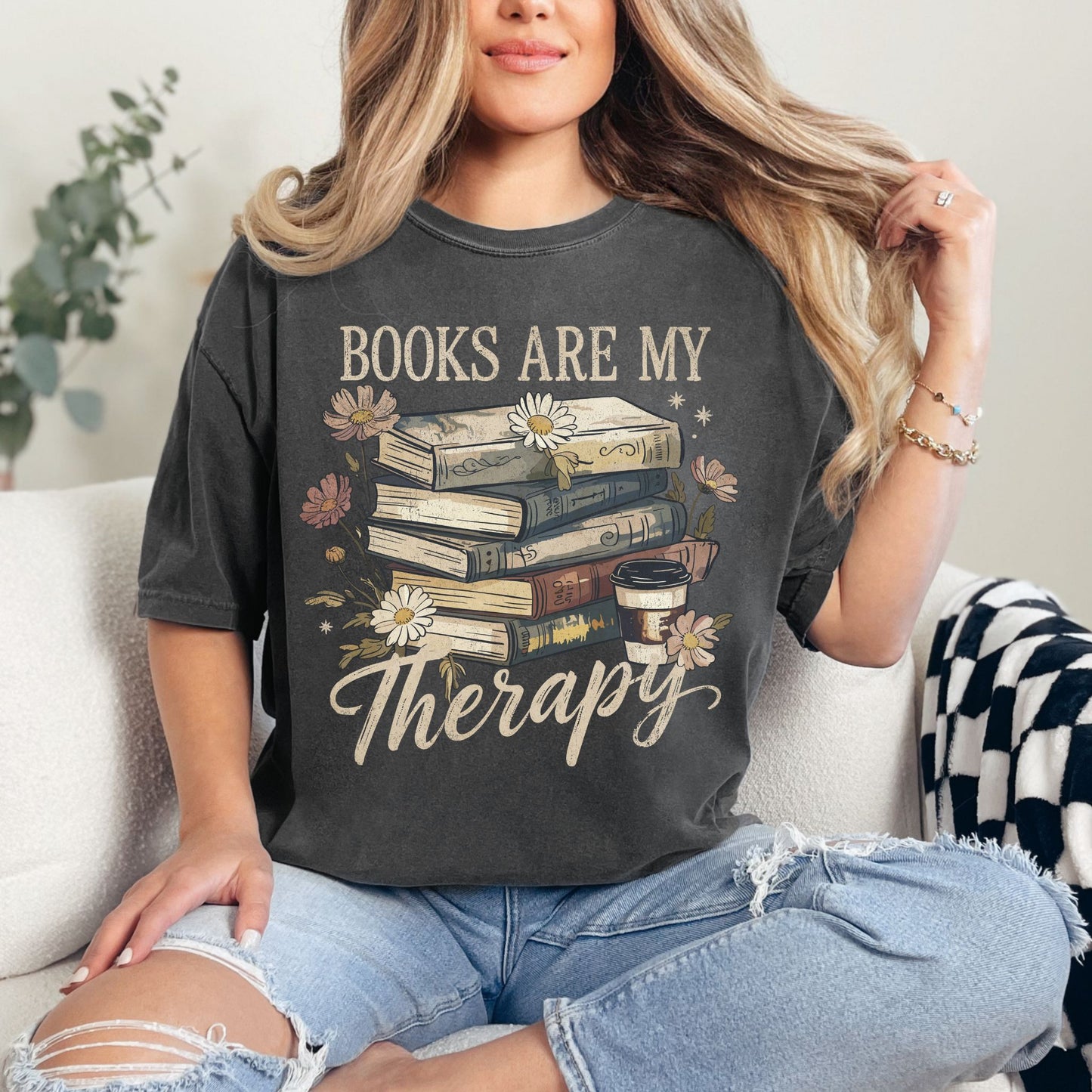 "Distressed Books Are My Therapy" graphic on dark charcoal gray (pepper) T-Shirt.