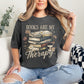 "Distressed Books Are My Therapy" graphic on dark charcoal gray (pepper) T-Shirt.