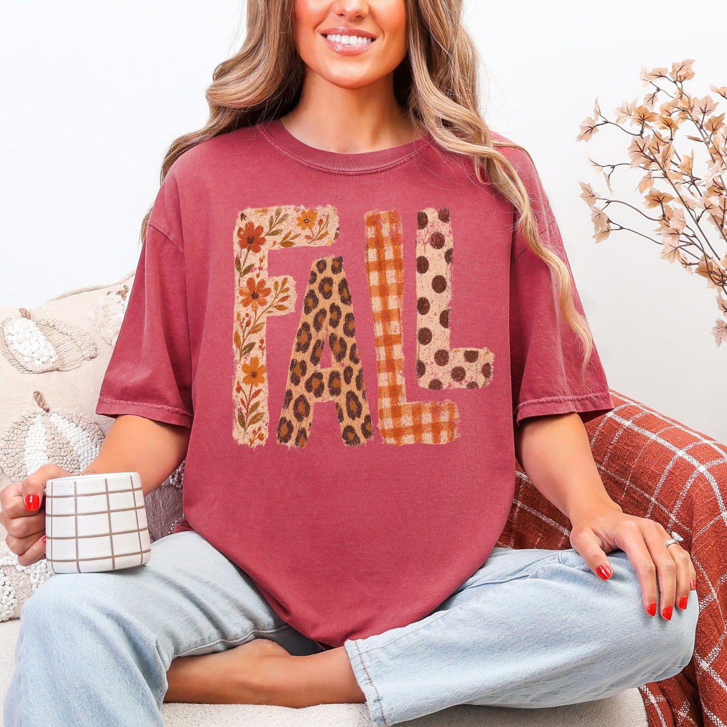 "Distressed Fall Floral Leopard graphic" on muted warm brick red (brick) t-shirt.