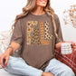 "Distressed Fall Floral Leopard graphic" on rich brown (espresso) t-shirt.