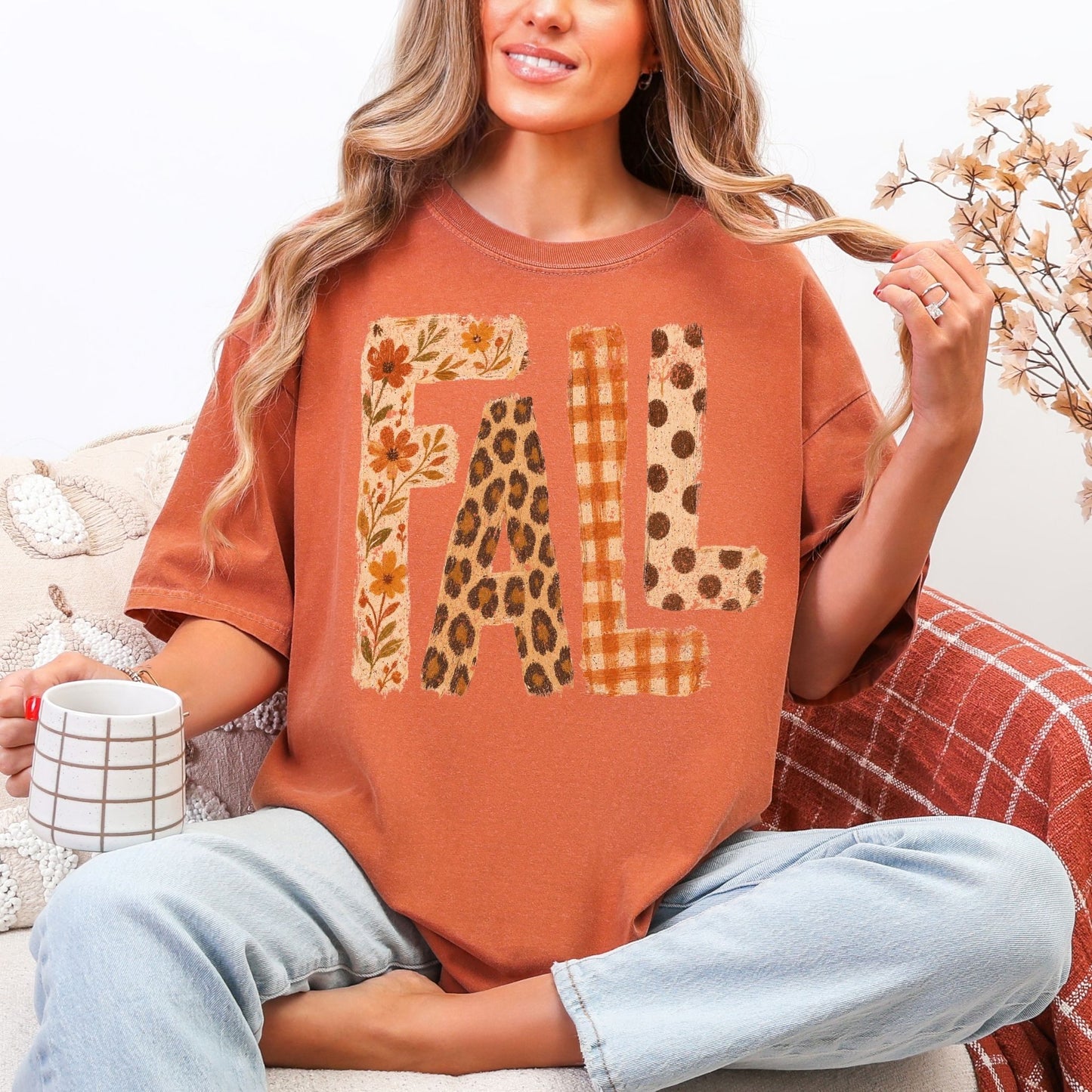 "Distressed Fall Floral Leopard graphic" on muted burnt orange (yam) Tshirt.
