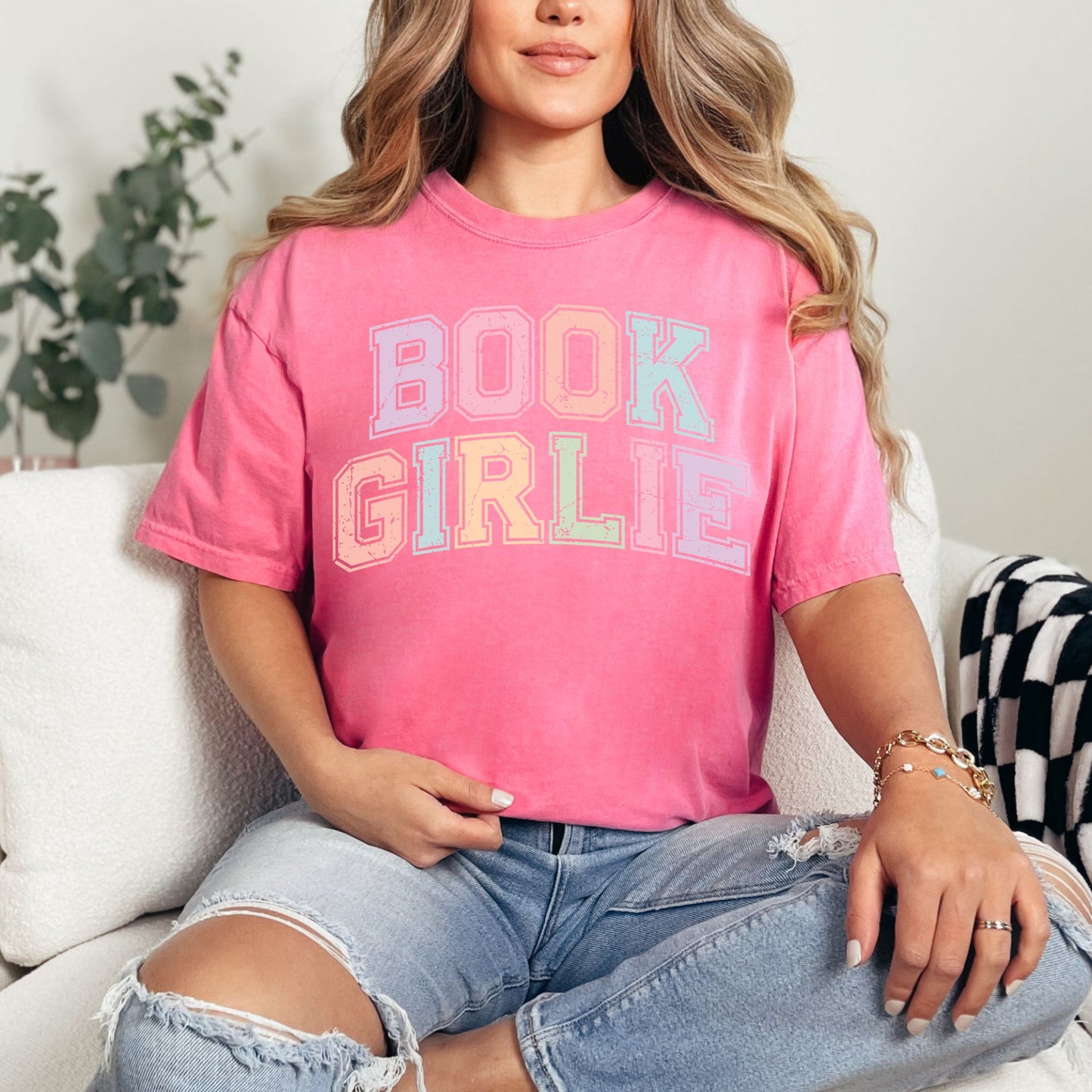 "Distressed Pastel Book Girlie" graphic on bright raspberry pink (crunchberry)  t-shirt.