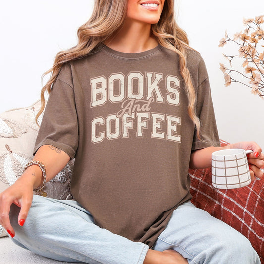 "Distressed Fall Books and Coffee" graphic in a cream color on rich brown (espresso) t-shirt.
