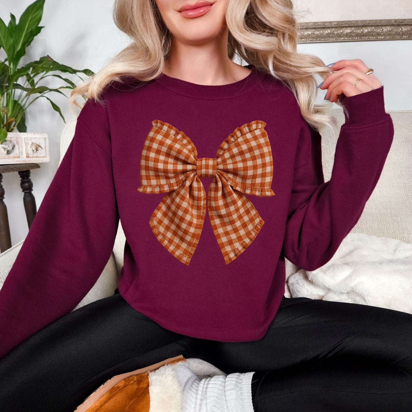 “Fall Gingham Bow" graphic on deep red (maroon) Gildan 18000 Sweatshirt.