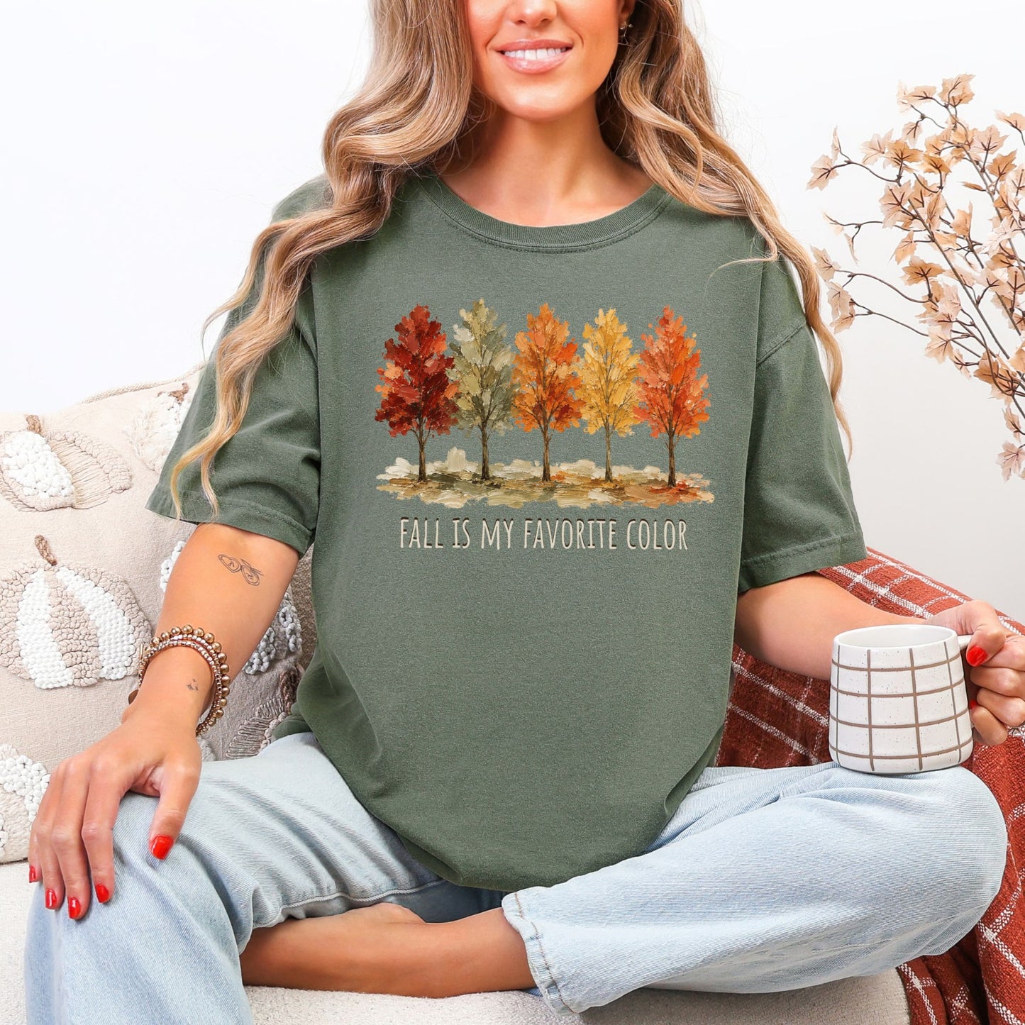“Fall is My Favorite Color" graphic on muted earthy green (moss) Comfort Colors t-shirt.