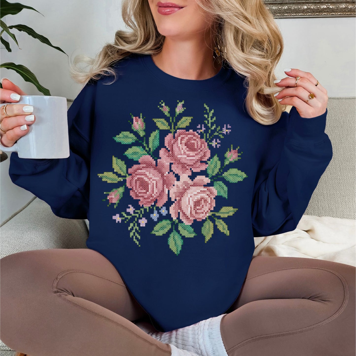 "Faux Cross Stitch Roses" graphic on deep navy blue (navy) sweatshirt.