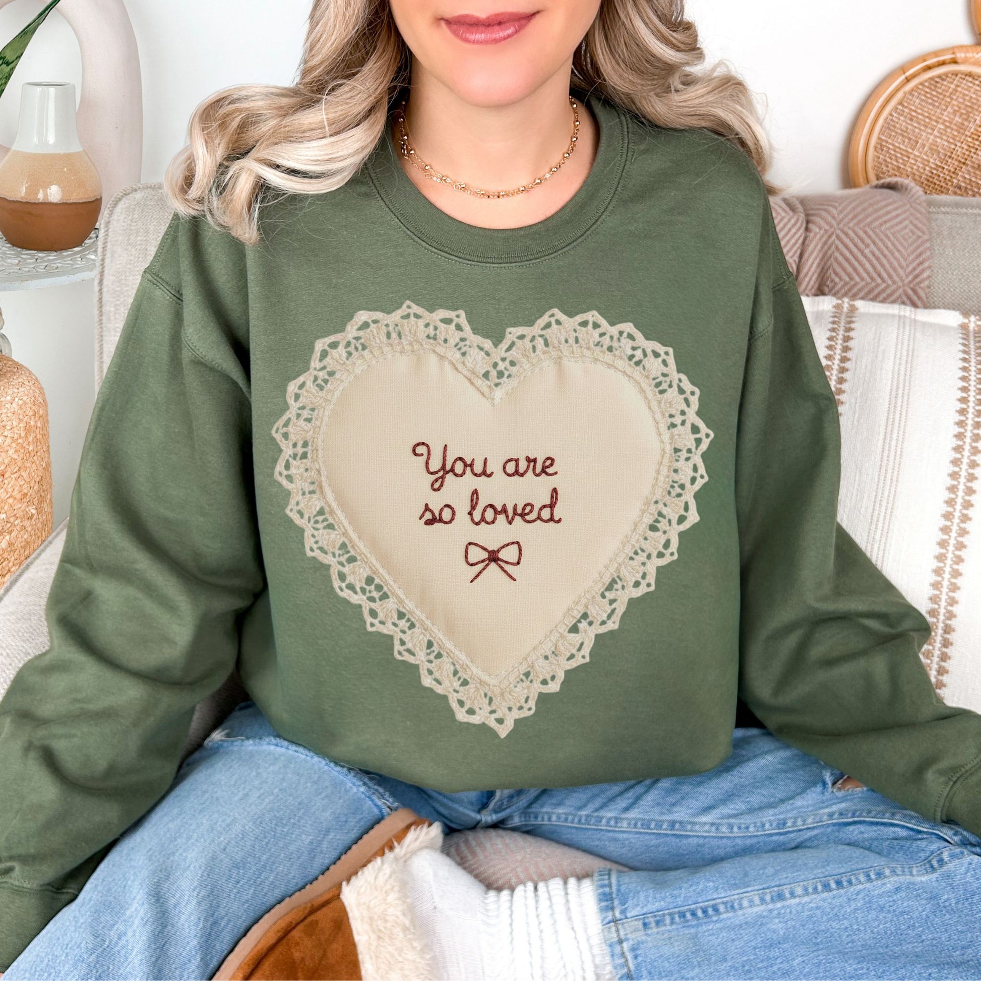 "Faux Embroidery Heart" graphic on  muted olive green (military green) sweatshirt