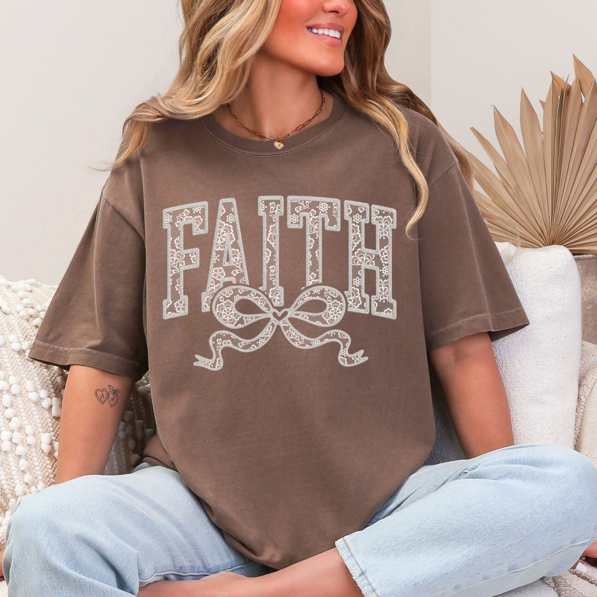 "Faux Embroidery Lace Faith" graphic on rich brown (espresso) (violet) T-Shirt.