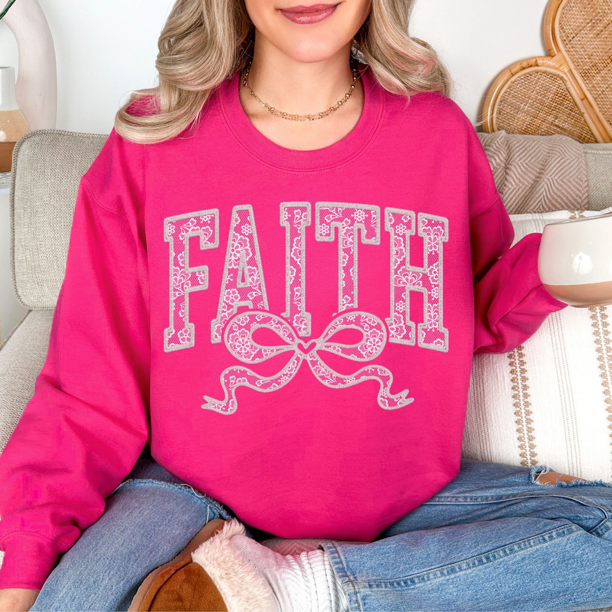 "Faux Embroidery Lace Faith" graphic on bright pink (heliconia) Sweatshirt.