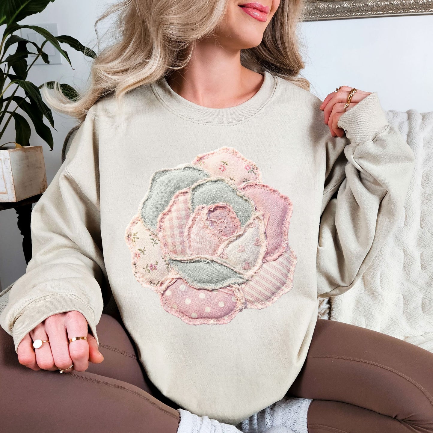 "Faux Patchwork Rose" graphic on light warm beige (sand) Sweatshirt.
