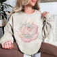 "Faux Patchwork Rose" graphic on light warm beige (sand) Sweatshirt.