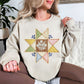 “Faux quilted Star" graphic on light warm beige (sand) Sweatshirt.