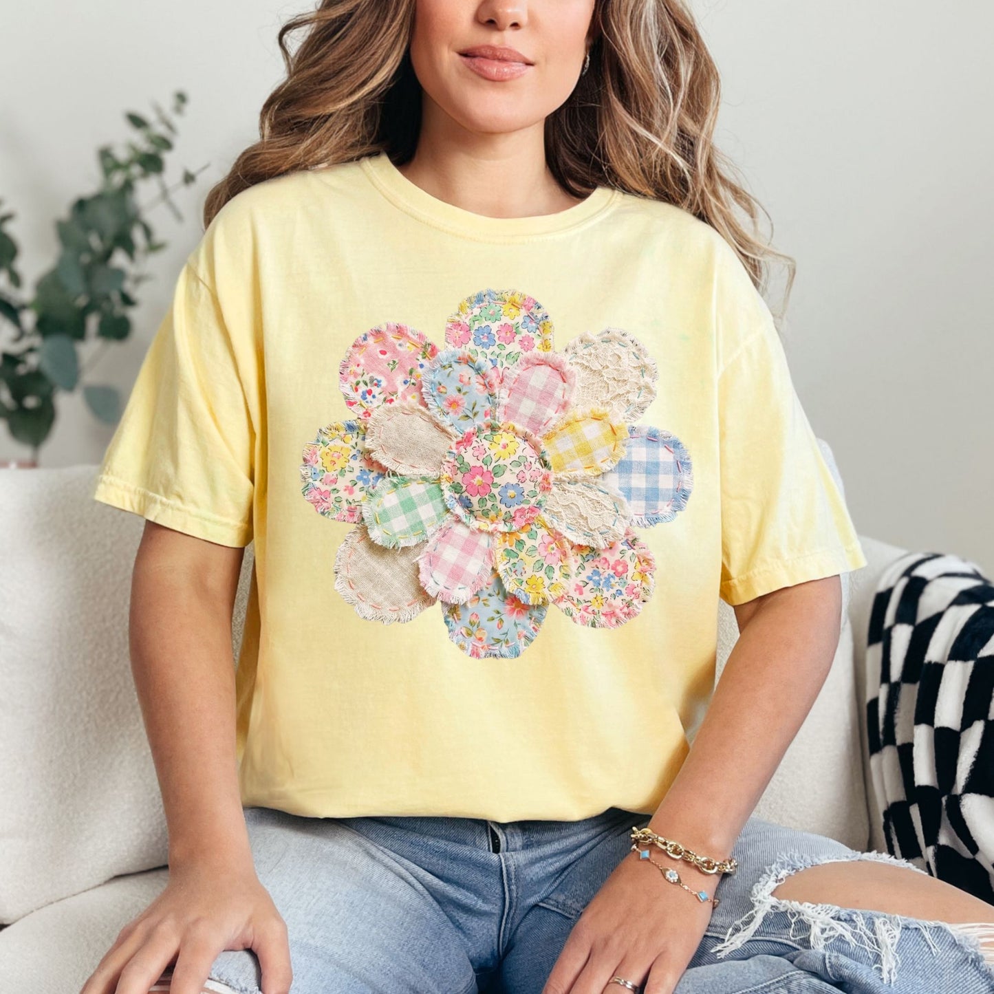Model is wearing a Comfort Colors 1717 t-shirt in soft yellow (butter) featuring a faux patchwork flower with pastel floral prints, gingham patterns, and fabric-style textures.
