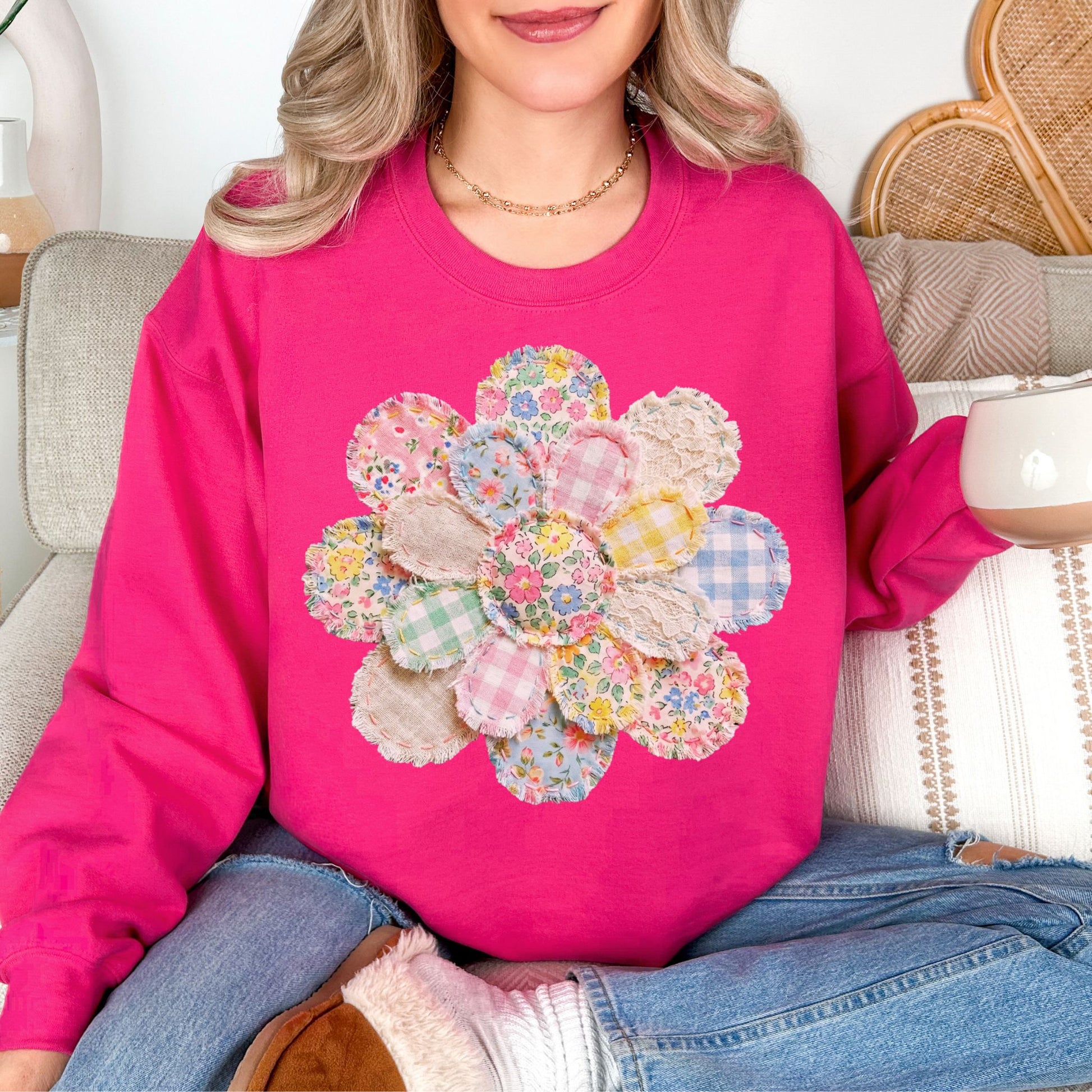 "Faux Spring Patchwork Flower" graphic on bright pink (heliconia) Sweatshirt.