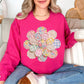 "Faux Spring Patchwork Flower" graphic on bright pink (heliconia) Sweatshirt.