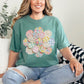 "Faux Spring Patchwork Flower" on soft light green (light green) T-shirt.