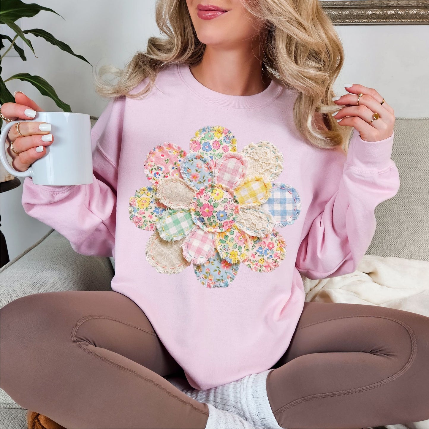 "Faux Spring Patchwork Flower" graphic on soft pale pink (light pink) Sweatshirt.