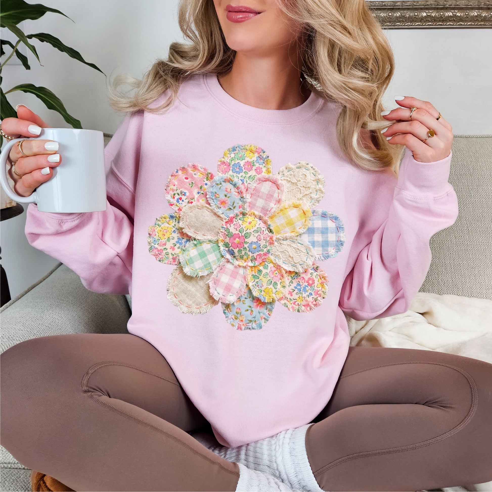"Faux Spring Patchwork Flower" graphic on soft pale pink (light pink) Sweatshirt.