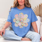 "Faux Spring Patchwork Flower" on muted blue-green (mystic blue) T-shirt.