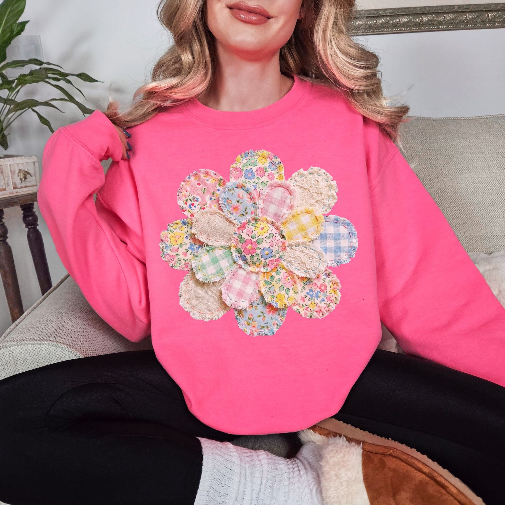 "Faux Spring Patchwork Flower" graphic on fluorescent bright pink (safety pink) Sweatshirt.