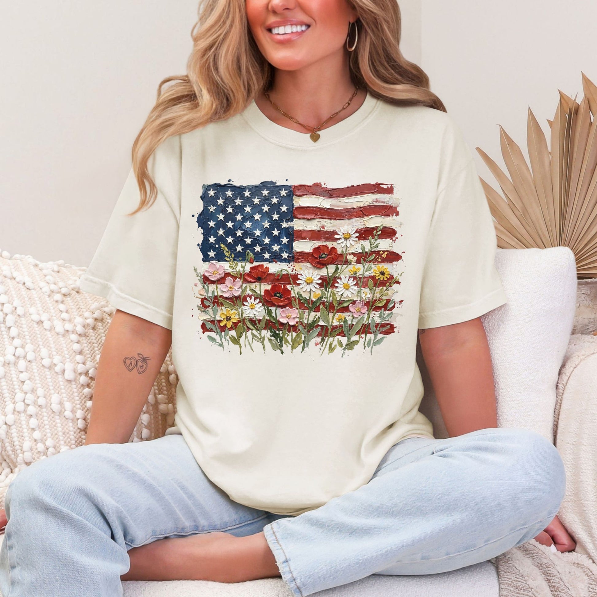 "Floral American Flag Faux Paint" on soft off-white (ivory) T-Shirt.