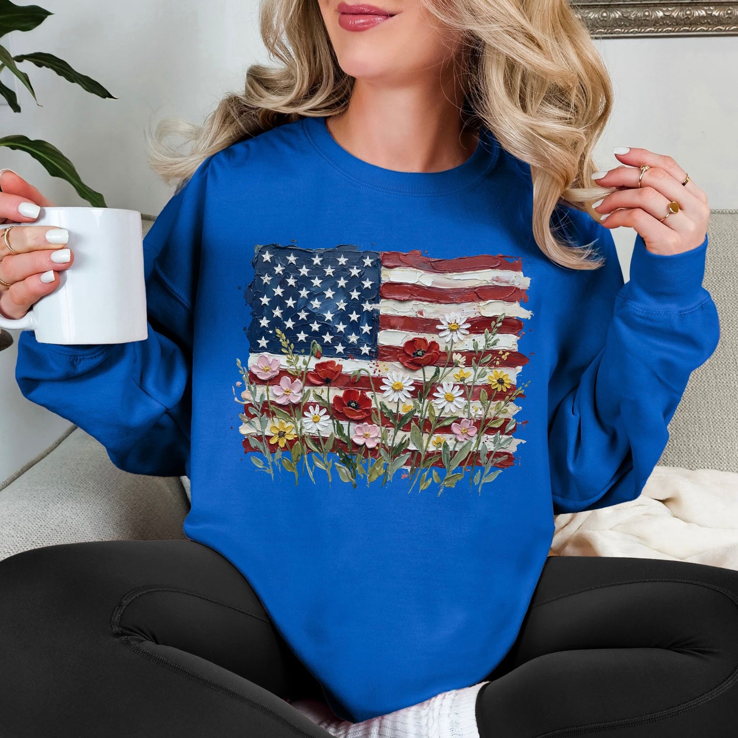 "Floral American Flag Faux Paint" on bright medium blue (royal blue) Sweatshirt.