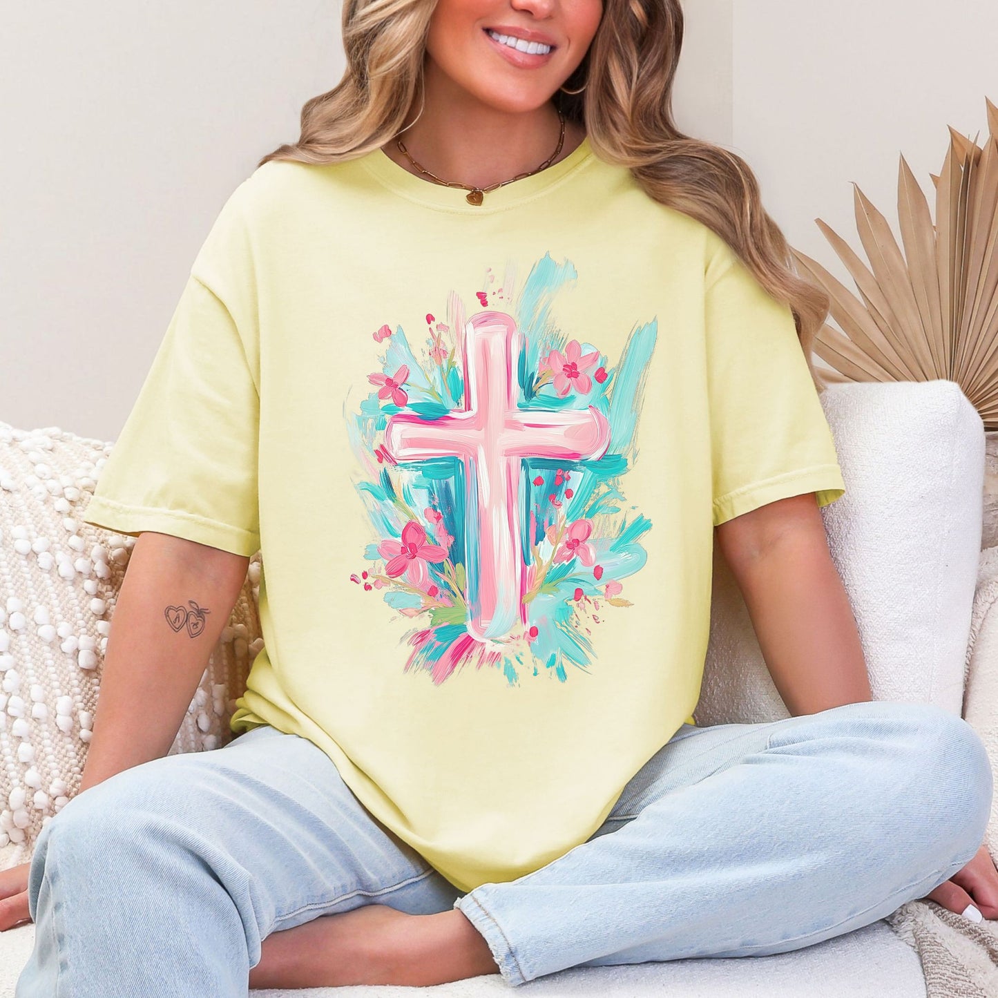 "Floral Pink Cross" graphic on soft pastel yellow (banana) T-Shirt.