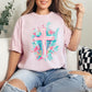 "Floral Pink Cross" graphic on soft pink (blossom) T-Shirt.