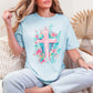 "Floral Pink Cross" graphic soft medium blue (chambray) T-Shirt.