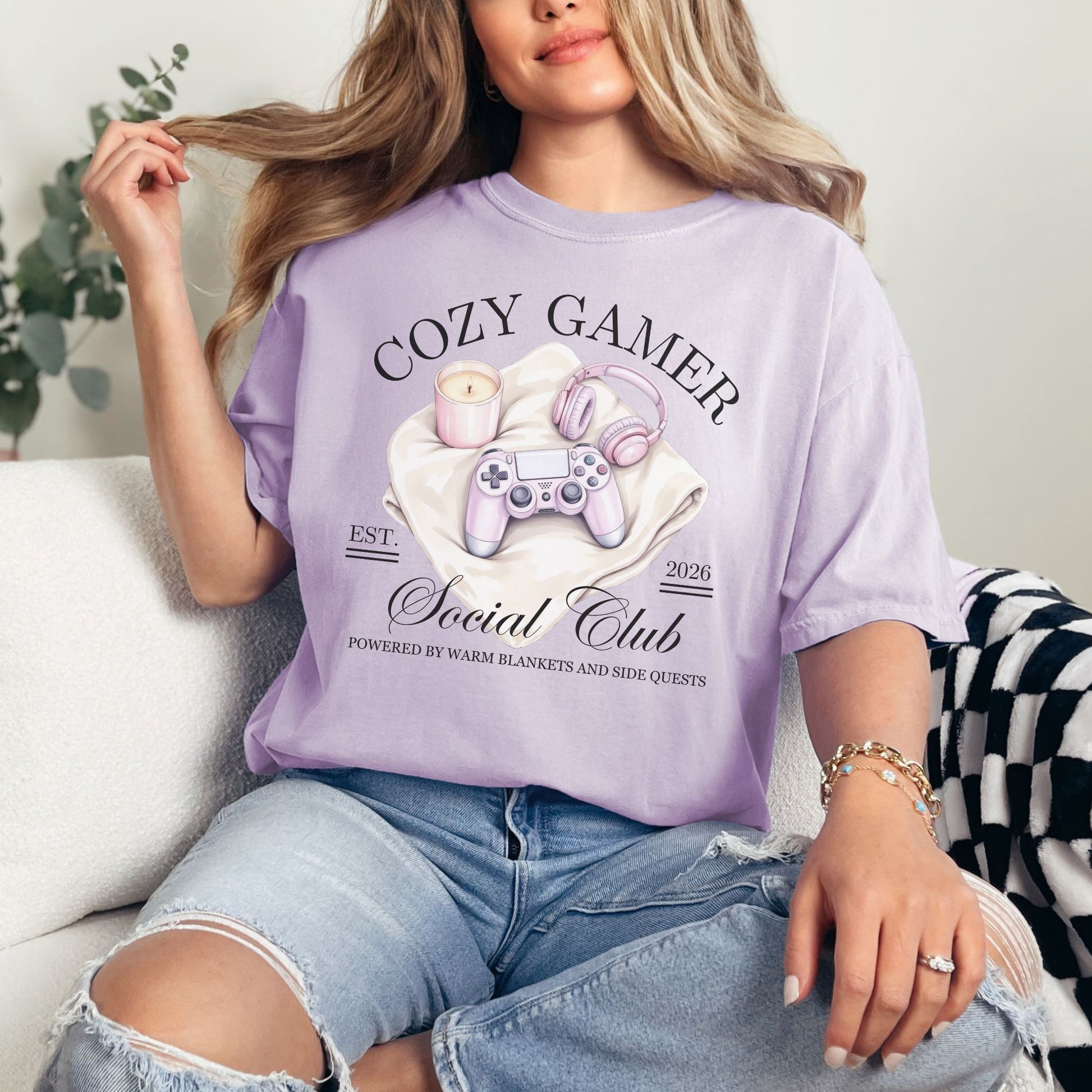 “Gamer Social Club" graphic on soft purple (orchid) t-shirt.