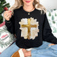 "Gold Christmas Cross" graphic on a black Gildan 18000 Sweatshirt.