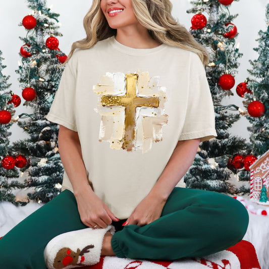 "Gold Christmas Cross" graphic on a Comfort Colors 1717 t-Shirt on soft off-white (ivory).