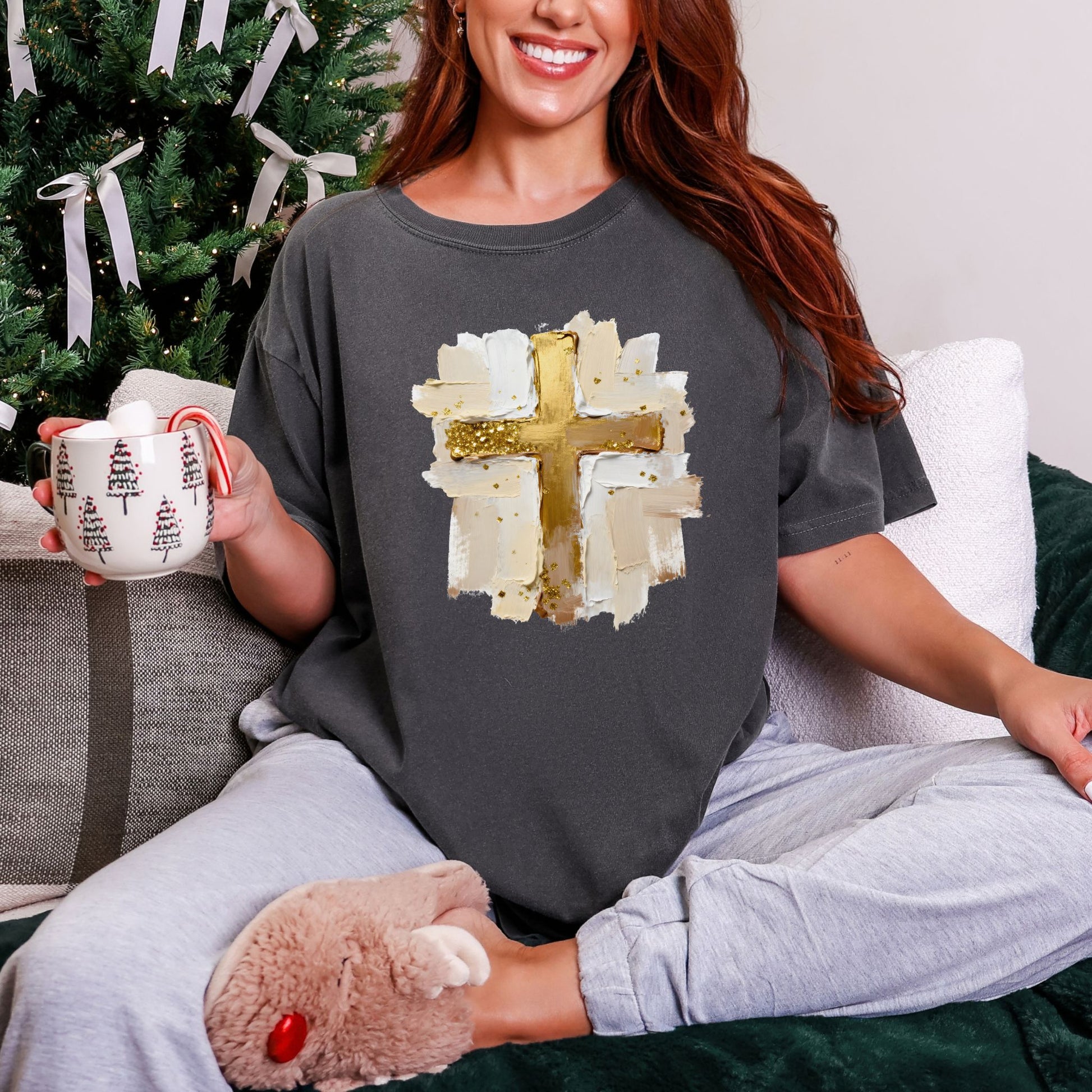 "Gold Christmas Cross" graphic on a Comfort Colors 1717 t-Shirt on dark charcoal gray (pepper).