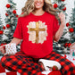"Gold Christmas Cross" graphic on a Comfort Colors 1717 t-Shirt on classic true red (red).