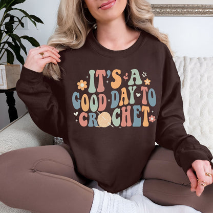 "It's A Good Day To Crochet" graphic on deep dark brown (dark chocolate) sweatshirt.