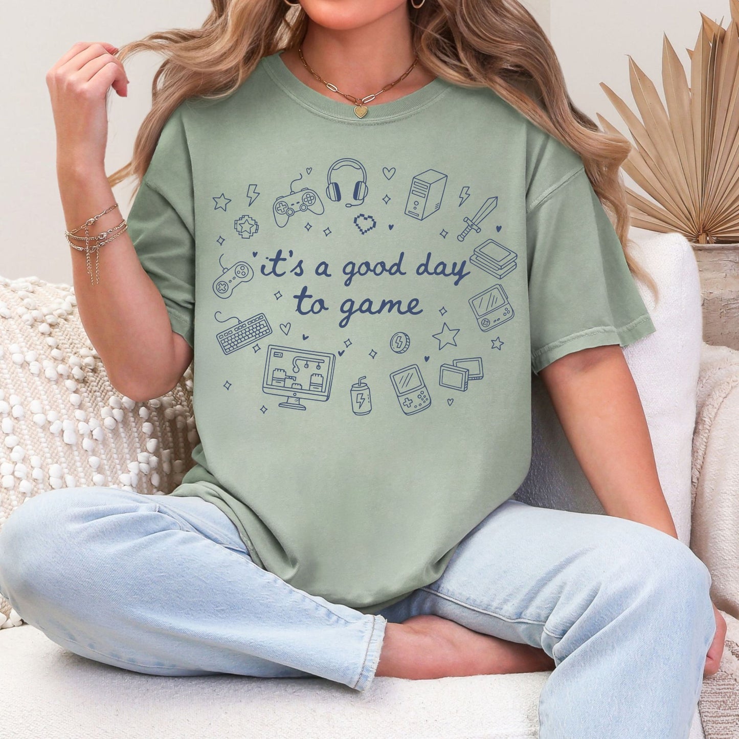 "Good day to game" graphic on muted teal-green (bay) T-Shirt.