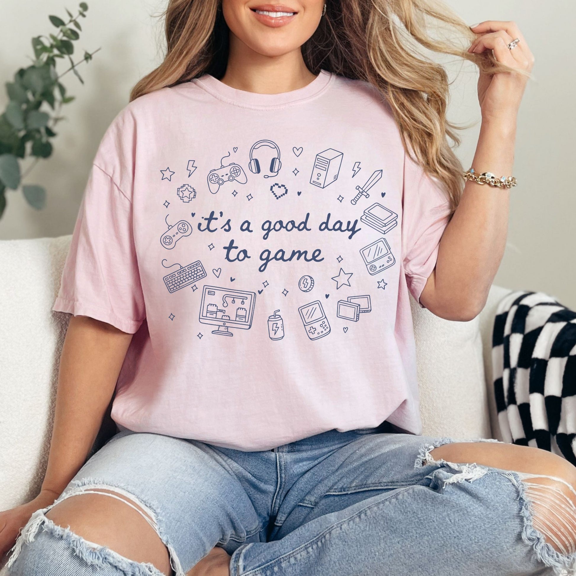 "Good day to game" graphic on soft pink (blossom) T-Shirt.