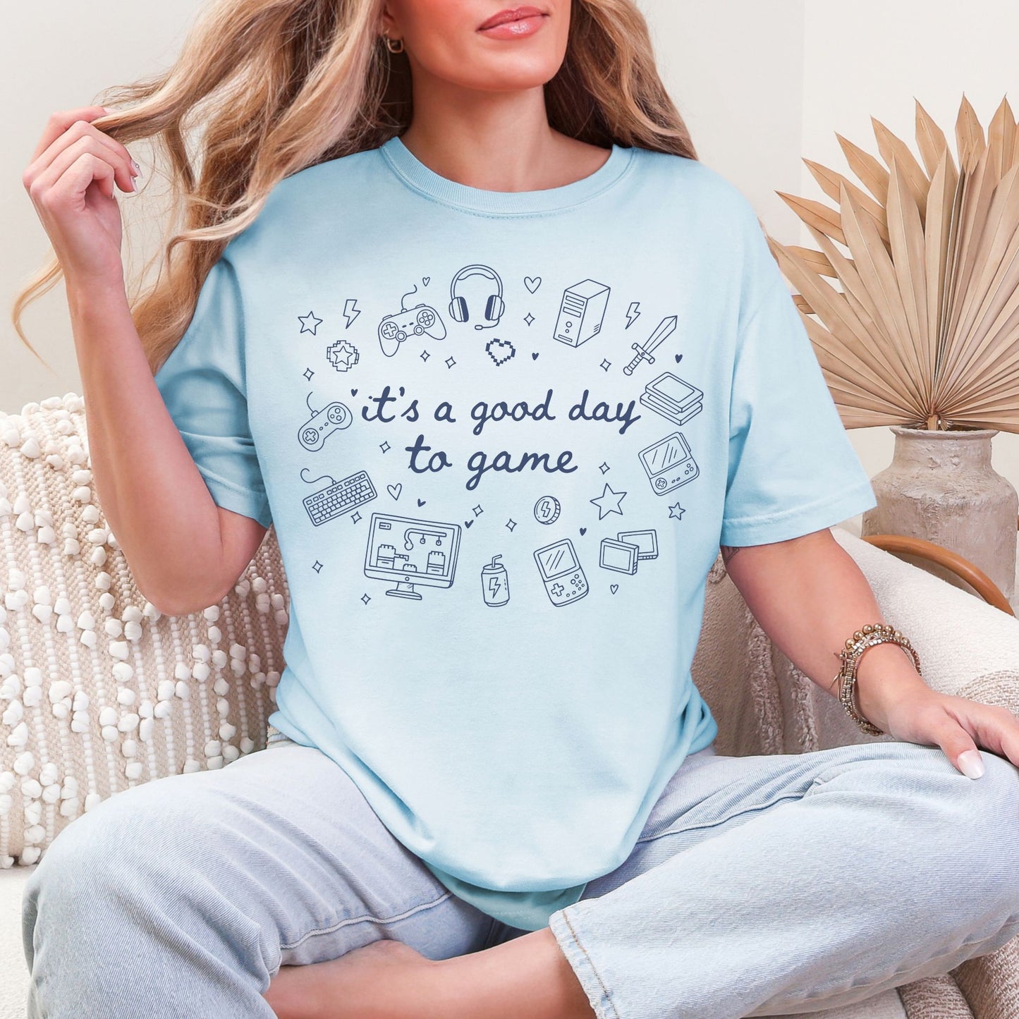 "Good day to game" graphic on soft medium blue (chambray) T-Shirt.