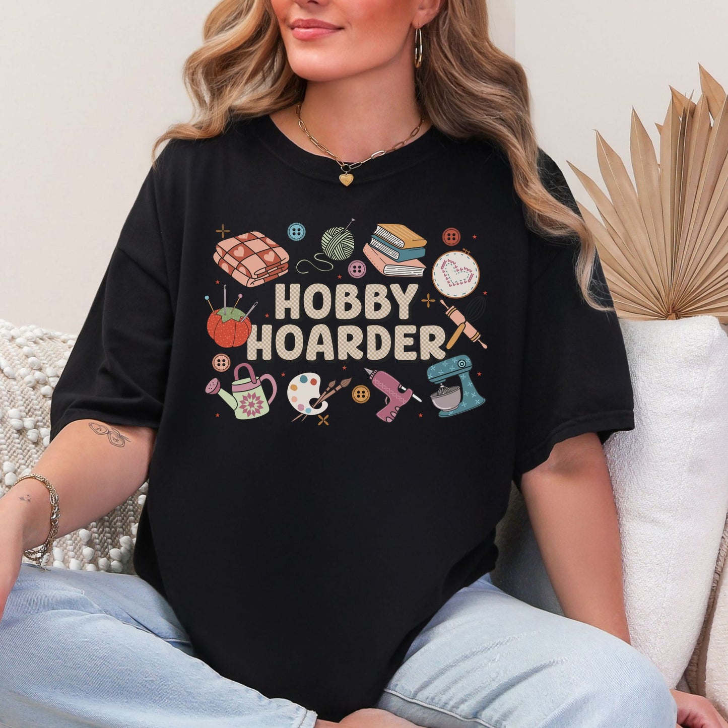"Hobby Hoarder" graphic on Black t-shirt.